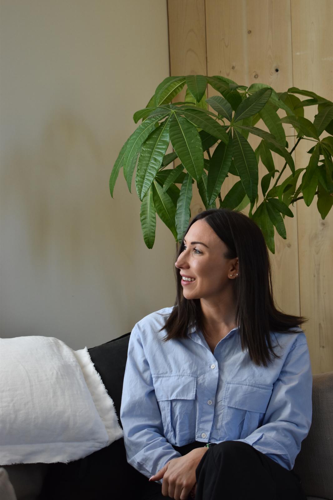 Bianca Borrello smiling in a comfortable setting.